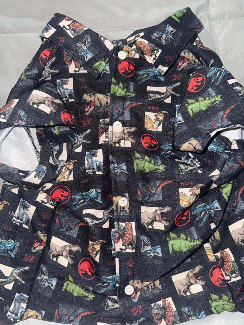 Universal Black Jurassic Dinosaur Print Dog Shirt with Red and Green Accents